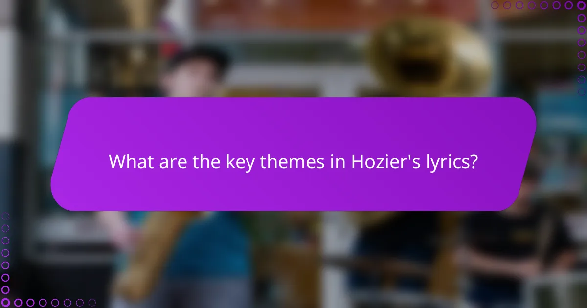What are the key themes in Hozier's lyrics?